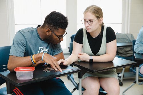 Teacher and student working one-on-one
